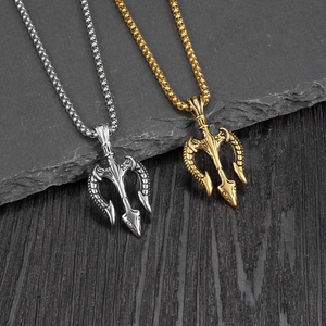 Detailed shot of retro trident pendants in gold and silver finish with steel bead chains