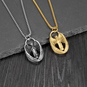 Vintage Engelsflügel Relief Anhänger Halskette in Gold und Silber mit Metallkette