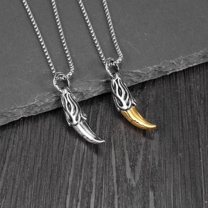 Retro punk wolf tooth pendant necklace in silver and gold metal with bead chain