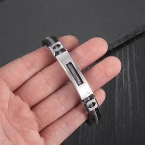 Men's minimalist stainless steel mesh plate bracelet with black silicone strap