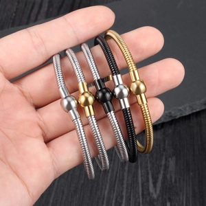 Set of flexible stainless steel snake chain bracelets in silver, gold, and black finishes