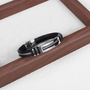 Minimalist black silicone bracelet for men with silver stainless steel chain detail