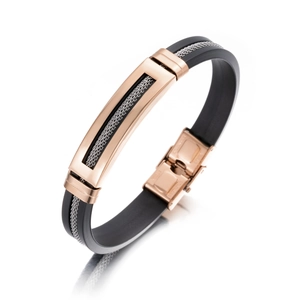 Detailed view of silicone bracelet with rose gold metal plate and inlaid steel chains