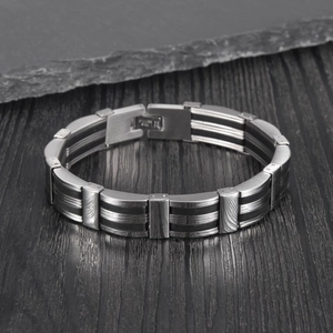 Bracelet hip-hop multicouche en acier inoxydable et silicone noir pour homme avec fermoir