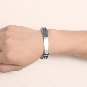 Men's minimalist stainless steel bracelet with a black silicone multi-layer wristband