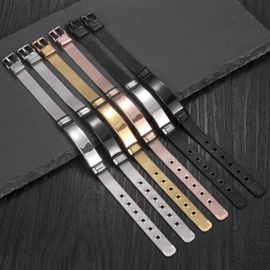 Minimalist mesh watch band bracelets in assorted metallic colors on dark stone background