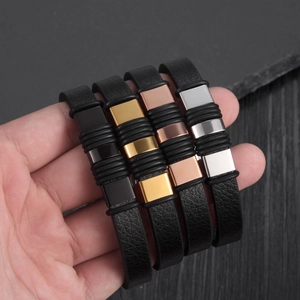 Men's black leather bracelet set with four colors of metal decorative charms