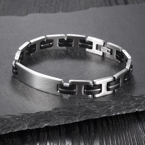 Bracciale da uomo in acciaio inossidabile con cinturino in silicone nero e placca curva