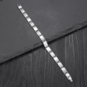 Minimalist silver stainless steel geometric link bracelet with a matte brushed finish