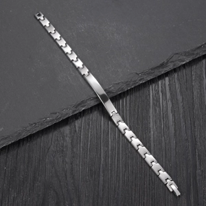 Sleek silver stainless steel link bracelet with a polished rectangular bar for women