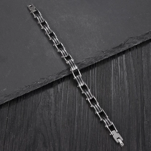 Industrial style stainless steel chain bracelet with black silicone inserts for men