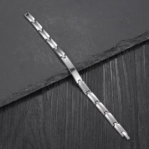 Polished stainless steel branch shape bracelet with engraved textured arrow chain links