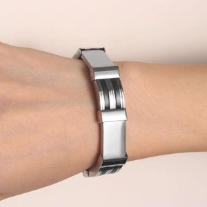Men's polished stainless steel and black silicone link bracelet in tough industrial style