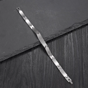 Minimalist silver steel chain bracelet with H-link design and smooth curved plate