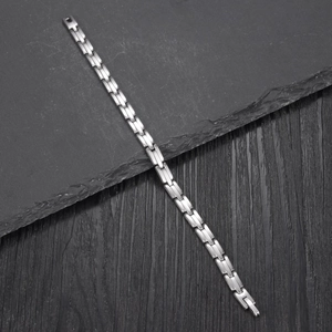 Minimalist silver stainless steel bracelet featuring polished rectangular chain links
