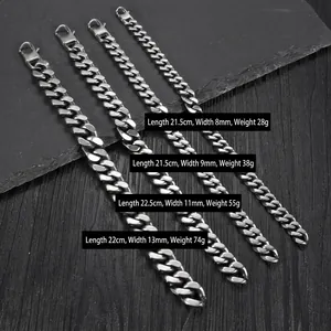 Vintage stainless steel Cuban link bracelets in 8mm to 13mm widths on a stone background