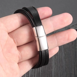 Men's multi-layer black braided leather bracelet with polished silver magnetic clasp