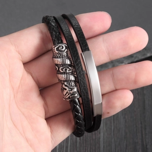 Bracelet multicouche en cuir tressé rétro pour hommes avec détails en acier argenté