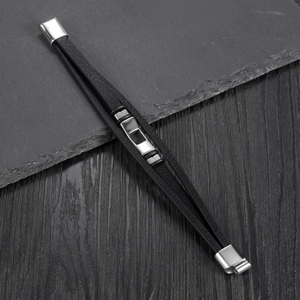 Men's multi-layer black leather bracelet with geometric stainless steel accents on stone