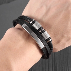 Men's multilayer braided leather bracelet with silver textured metal and magnetic clasp