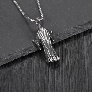 Gothic punk reaper pendant in vintage steel on rock and wood background with box chain