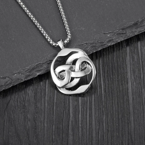 Vintage stainless steel necklace with double snake celtic knot pendant on dark stone