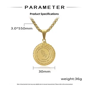 Macro view of gold stainless steel praying hands pendant with engraved Serenity Prayer text