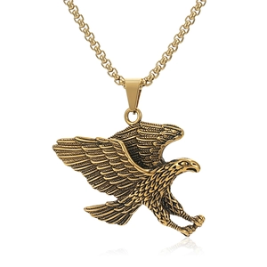 Mens vintage gold eagle pendant necklace with detailed spreading wings on a white background