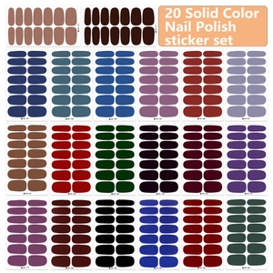 Set of 20 solid color nail polish stickers in various trendy shades with grid layout