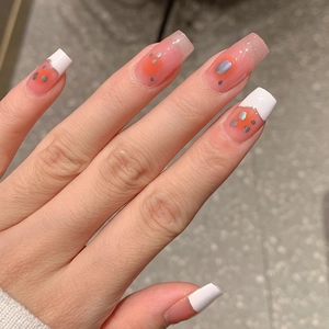 Long square French tip press-on nails with pink gradient and blush effect with silver glitter