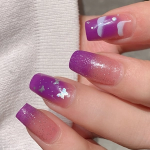 Long square purple gradient press-on nails with butterfly elements and silver glitter