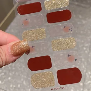 Deep red and gold glitter heart nail stickers set with star patterns for Valentines Day