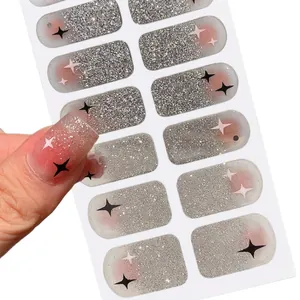 Glitter silver nail stickers with black and white star patterns for manicure design