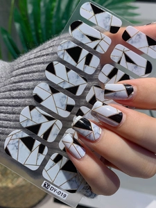 Detail of DY-019 self-adhesive nail wraps with black and white marble geometric patterns