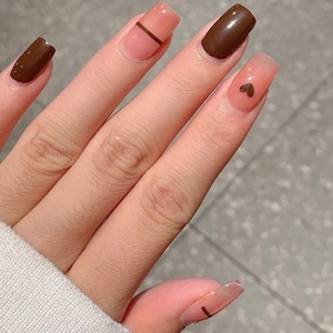Dark brown and light pink nail stickers with minimalist heart and stripe patterns