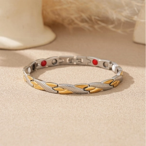 Detail of two-tone magnetic therapy bracelet with dragon scale texture and health magnets