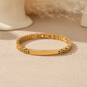 Minimalist 6mm 18K gold plated stainless steel watch-style bracelet with flat ID plate