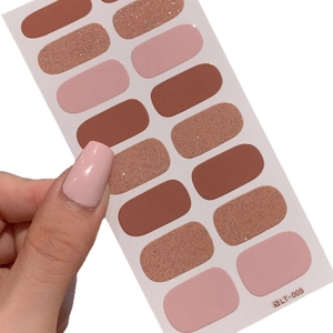 Gentle nude pink self-adhesive nail stickers with glitter accents and solid color finish