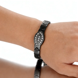 Detailed shot of black stainless steel bracelet with sparkling micro-pave stones inlay