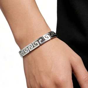 Mens stainless steel bracelet with Greek key pattern shown on wrist in silver finish