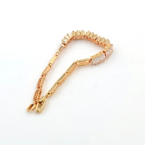 18K gold plated bracelet featuring cubic zirconia crystals and geometric links