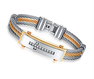 Detail of cable wire bracelet featuring cross pattern with crystal inlay on steel plate