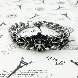 Men's gothic stainless steel bracelet with shield cross and wing charms in vintage silver