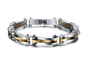 Macro detail of two-tone stainless steel link bracelet with industrial screw design