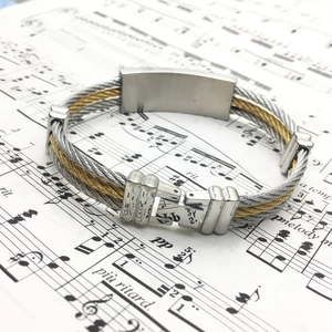 Fashionable men's stainless steel cable bracelet with gold and silver woven texture