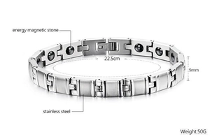 Macro detail of brushed stainless steel magnetic therapy bracelet with black energy stones