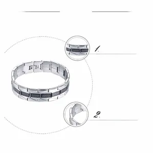 Detail of stainless steel bracelet with black Greek key pattern and precision polishing
