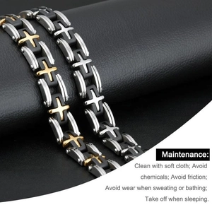 Men's punk stainless steel bracelet featuring black silicone links and gold cross