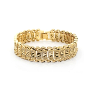 Detail of 18K gold plated men bracelet showing textured segmented links and engravings