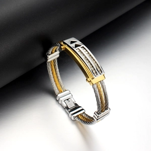 Bracciale bicolore in acciaio inossidabile con piastra e cristalli incastonati